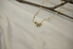 Gold Bow pendant - Image 2